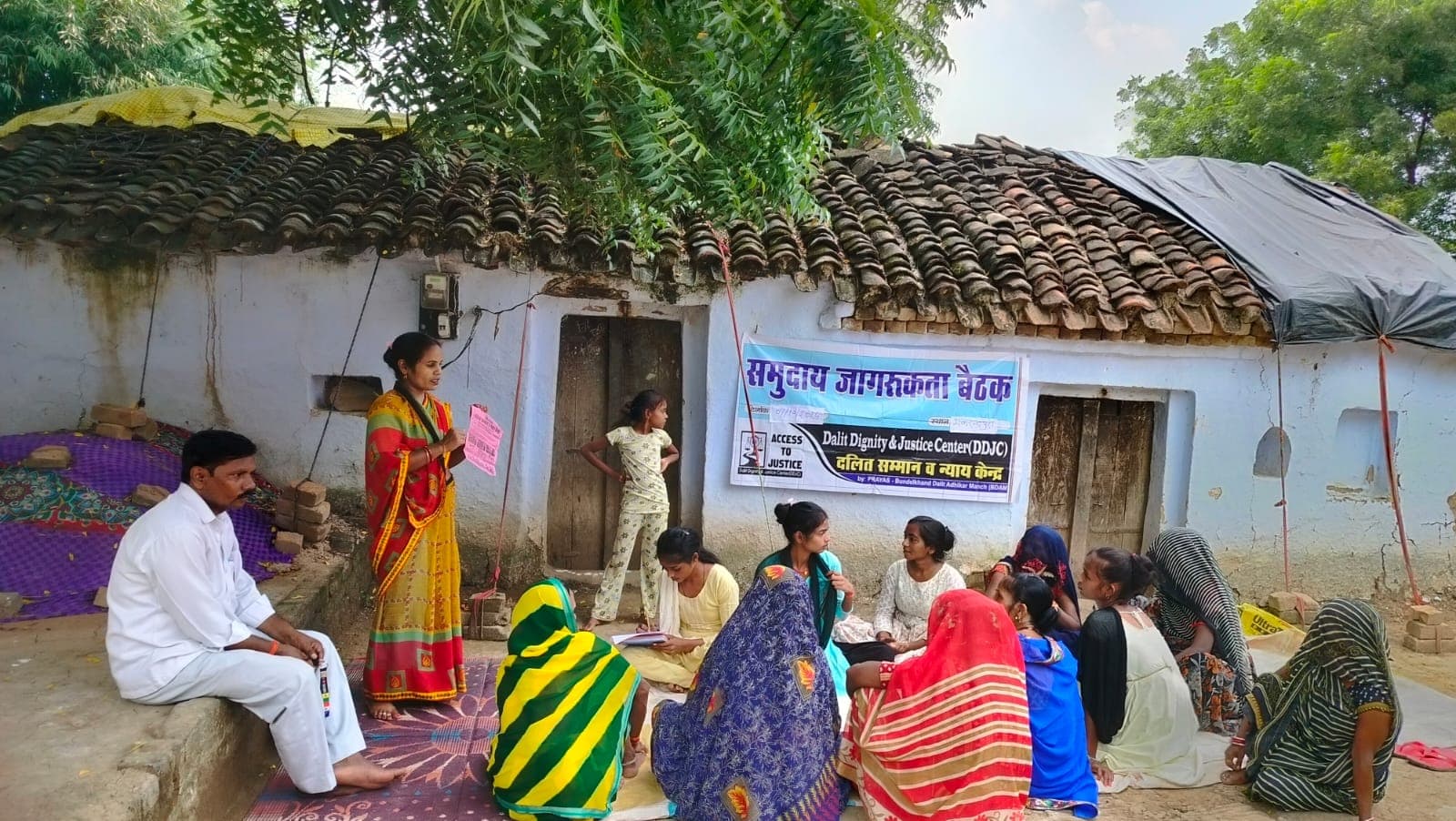 Community awareness meeting and grassroots legal literacy camp